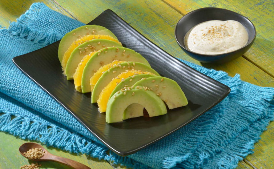 Avocados From Mexico Sliced Avocado and Oranges with Tahini Yogurt Sauce is a Heart-Check certified recipe.