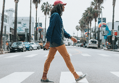 man walking crossing the street in Hollywood