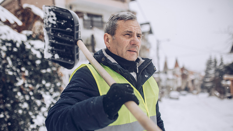 man shoveling snow