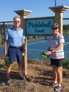 Frank Dent at pickleball court with friend