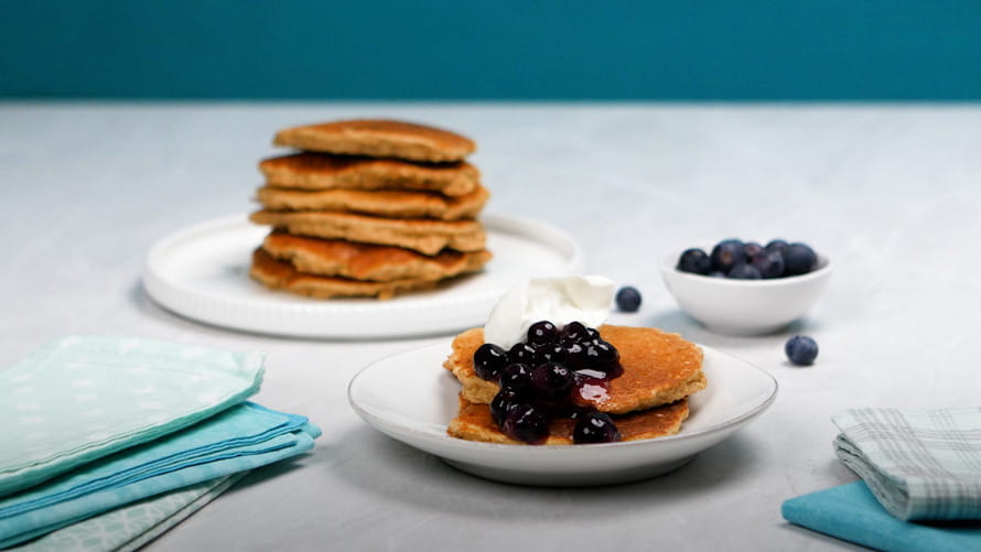 Pancakes with blueberry vanilla sauce.