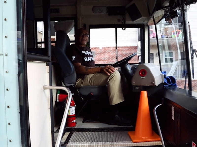 James Amos driving the Brown Bag Bus (Photo courtesy of the YMCA of Greater Montgomery).