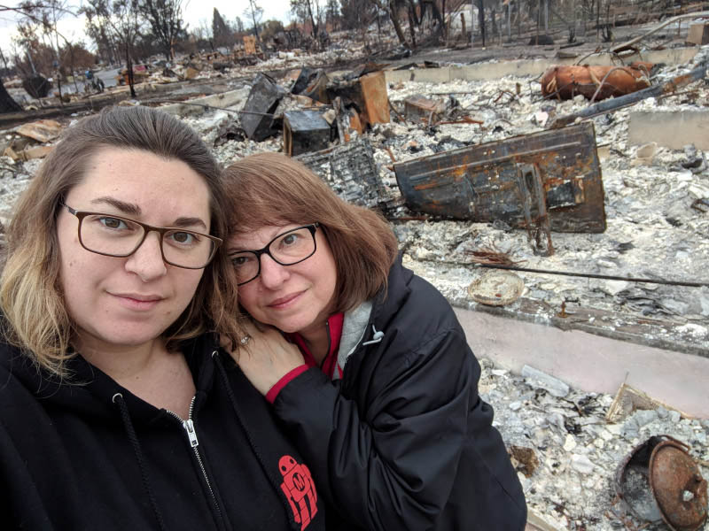 Melissa Geissinger (left) and her mother, Nancy Crain, in Geissinger’s Santa Rosa, California, neighborhood in 2017 after the Tubbs Fire. (Photo courtesy of Melissa Geissinger)