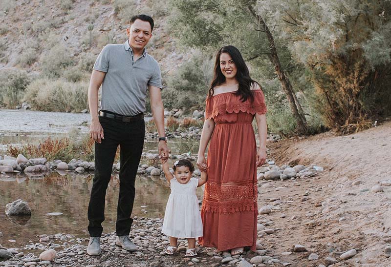 Lupita Garcia with her family, from left: Husband Samuel Higuera, daughter Maia Higuera and Lupita. (Photo by The Baby Whisperer Portraits)