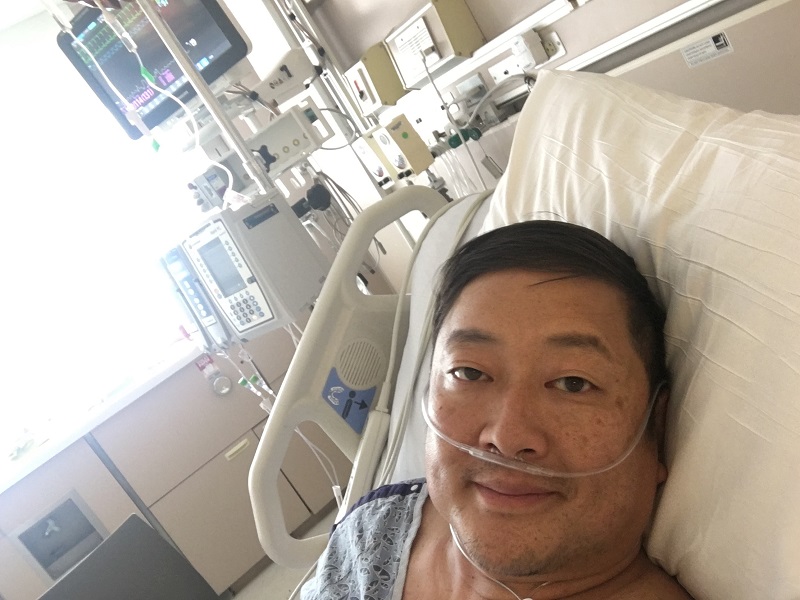 Dave Kim recuperates in the hospital after his stroke. (Photo courtesy of Dave Kim)