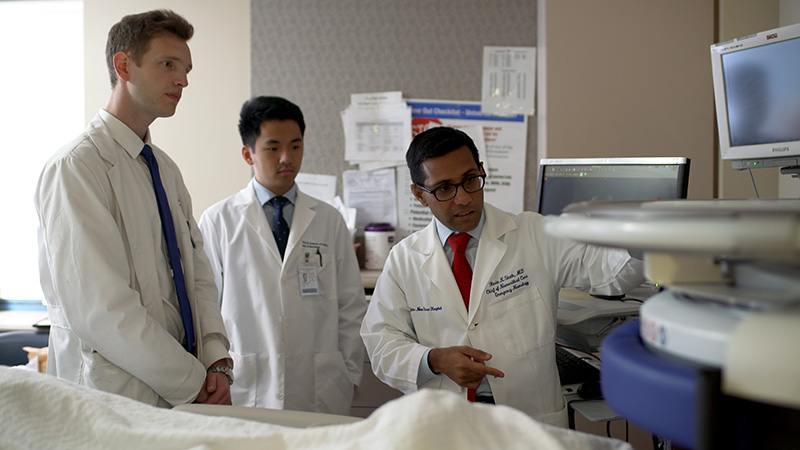 Dr. Kevin Sheth (right) working with his team. (Photo courtesy of Yale School of Medicine)
